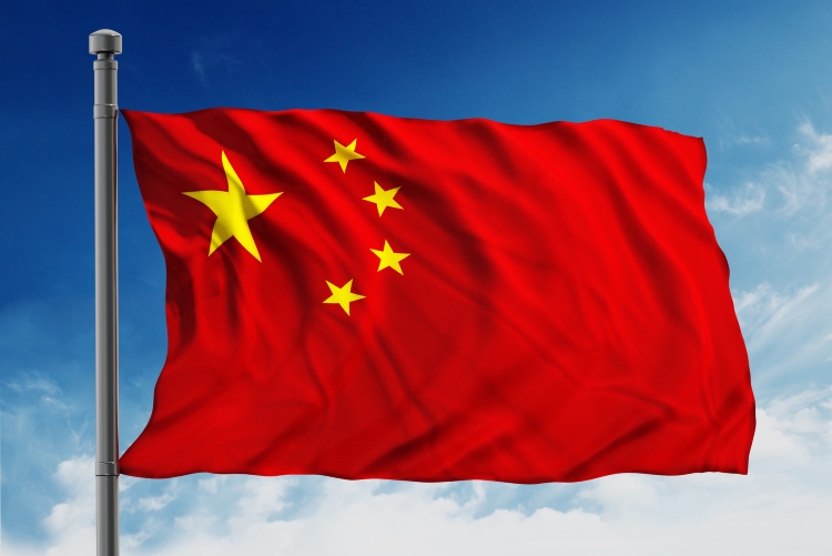 Flag of China on blue sky