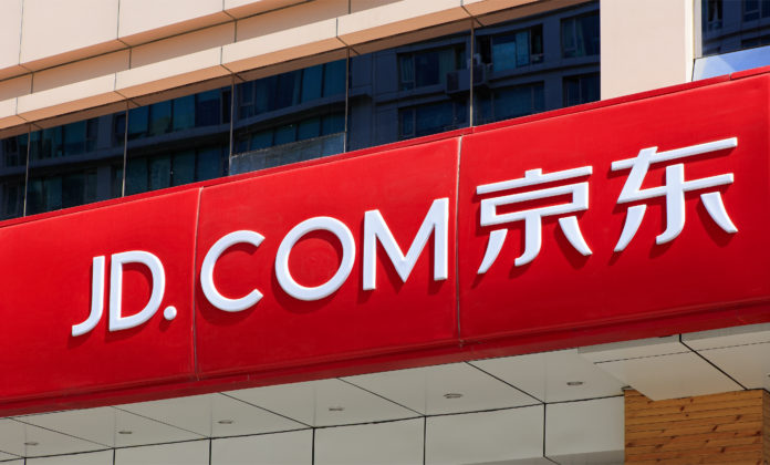 BEIJING, CHINA-SEPTEMBER 3, 2015: JD.COM logo. JD.com is a Chinese electronic commerce company that had a revenue of more than 18 billion USD (2014). JD.com