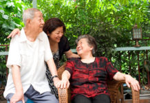 AdobeStock-Jack.Q_23681924-a-happy-family-old-couple-and-their-daughter