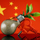 AdobeStock_promesaartstudio-238267605-Plug-plant-growing-inside-the-light-bulb-and-China-Flag-Green-eco-renewable-energy-concept