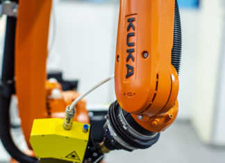 KUKA-robot-hand-AdobeStock_47030448